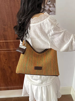 crossbody bag in orange with striped and woven