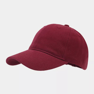 cap in burgundy featuring adjustable strap and fitted fit