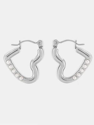 Sculpted wave hoop earrings in silver with bead accents