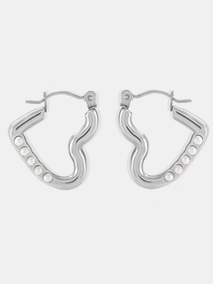 Sculpted wave hoop earrings in silver with bead accents