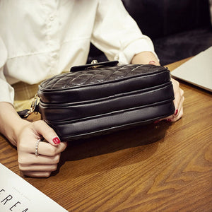 Quilted Turn-Lock Crossbody Bag in Black with quilted