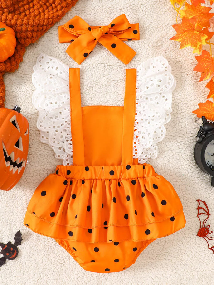 romper featuring polka dot in white with 65% cotton, 35% polyester Care instructions: Machine wash cold texture