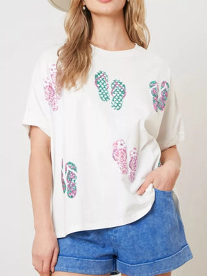 White polyester t-shirt with allover pink and green flip-flop print