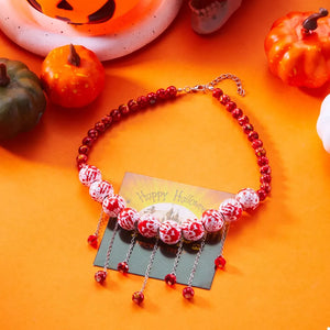 Iron, Resin, Silver-plated Care instructions: Avoid wearing during exercise, as necklace in Red with statement silhouette