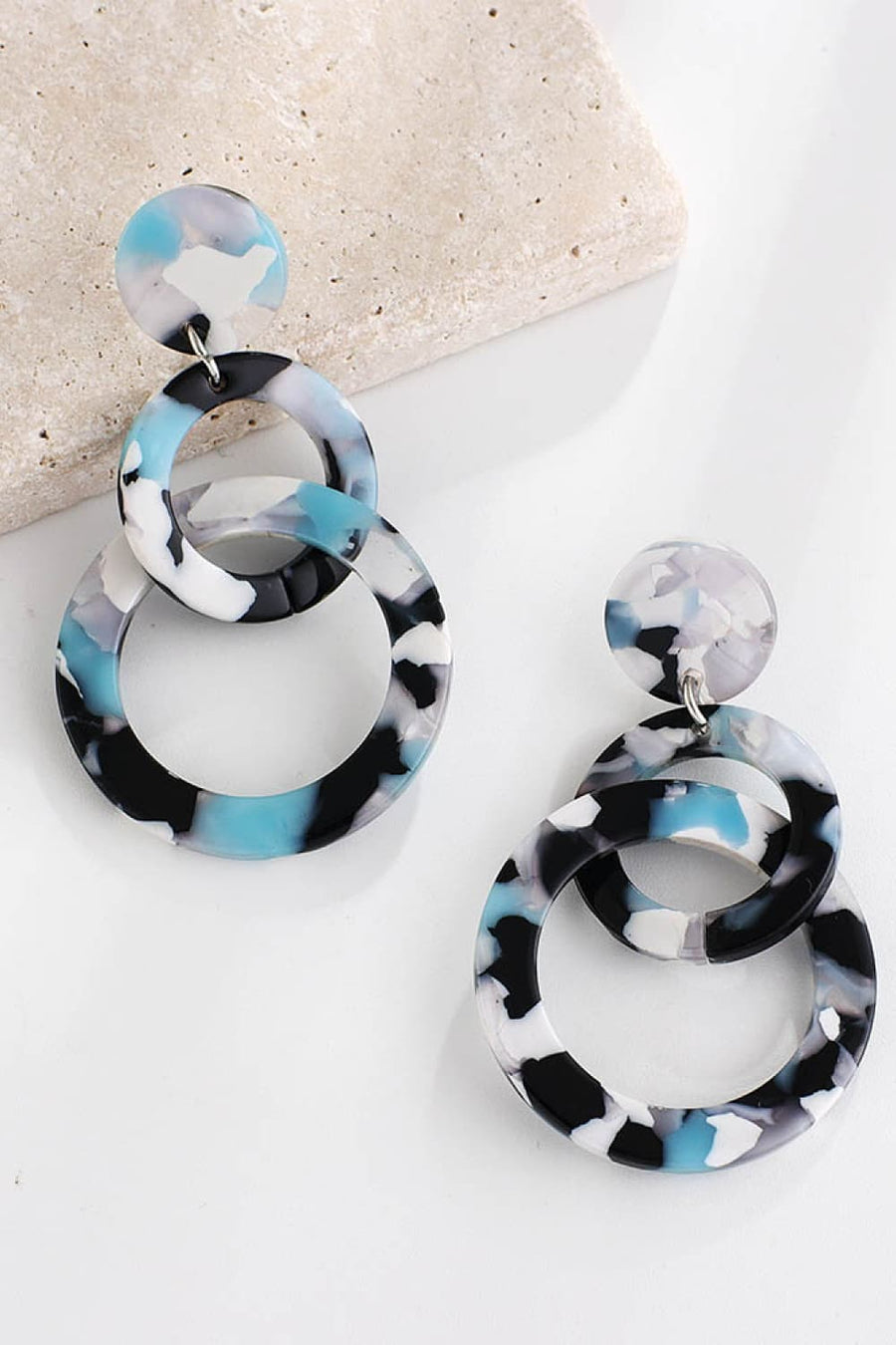 Blue and black marbled hoop earrings with round studs