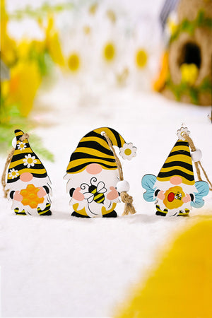 Whimsical bee gnome ornaments in yellow and black with honeycomb, bee, and daisy details.