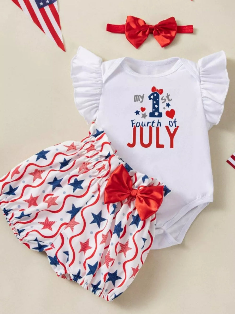 White baby outfit with ruffled sleeves, "my 1st Fourth of July" graphic, and star-print bloomer shorts.