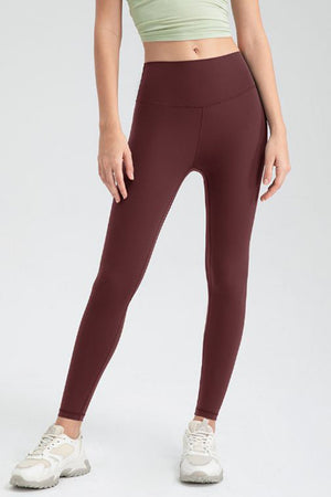 Sculpted seam high-waist performance leggings in wine.