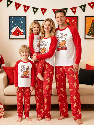 white pajama set featuring long sleeves and graphic print, gingerbread man print, candy cane print