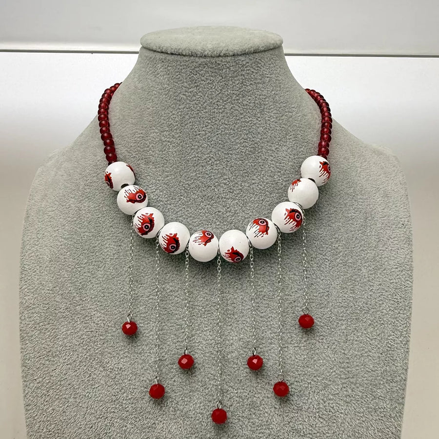 necklace featuring eyeball motif in red with Resin,Zinc alloy,glass Care instructions: Avoid wearing during exercise, as
