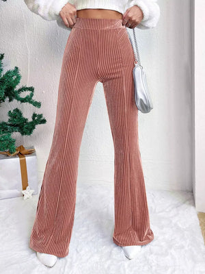 Dusty pink corduroy maternity flare pants with high waist and bell bottoms.