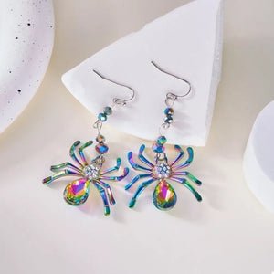 earrings in iridescent with animal motif and drop design