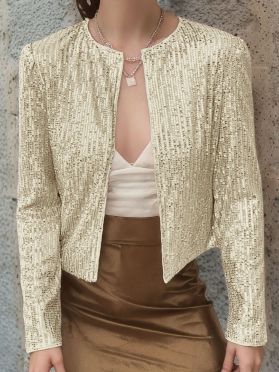 Gold sequin bolero jacket with a round neckline and long sleeves.