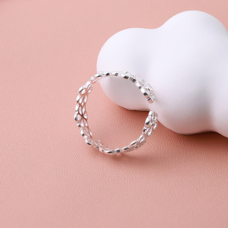 ring in silver with floral and adjustable