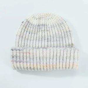 Textured mélange ribbed beanie in cream with subtle colorful flecks.
