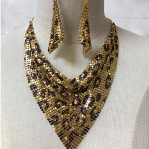 gold jewelry set with choker length necklace, long drop earrings and hook-and-eye, clasp
