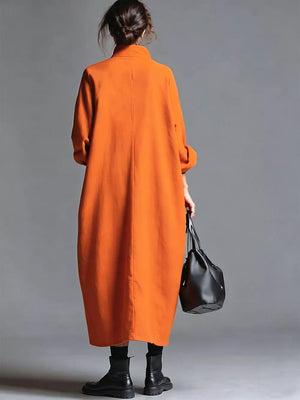 Orange-red oversized midi dress with mock neck