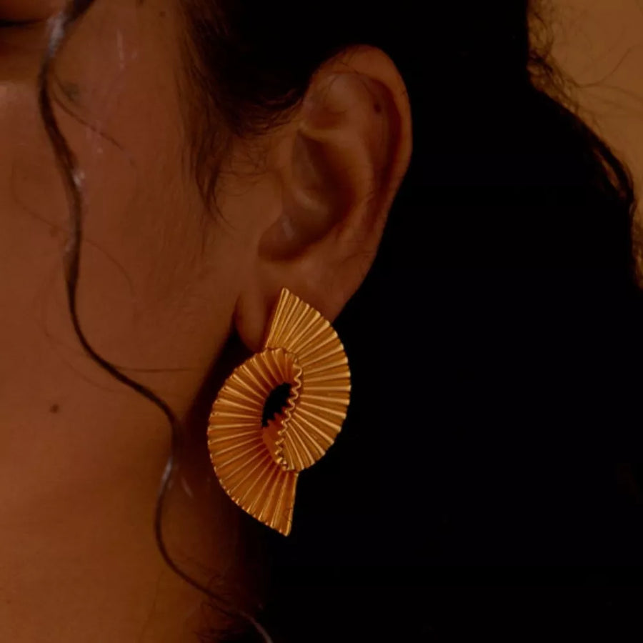 Gold earrings featuring gold-plated and geometric