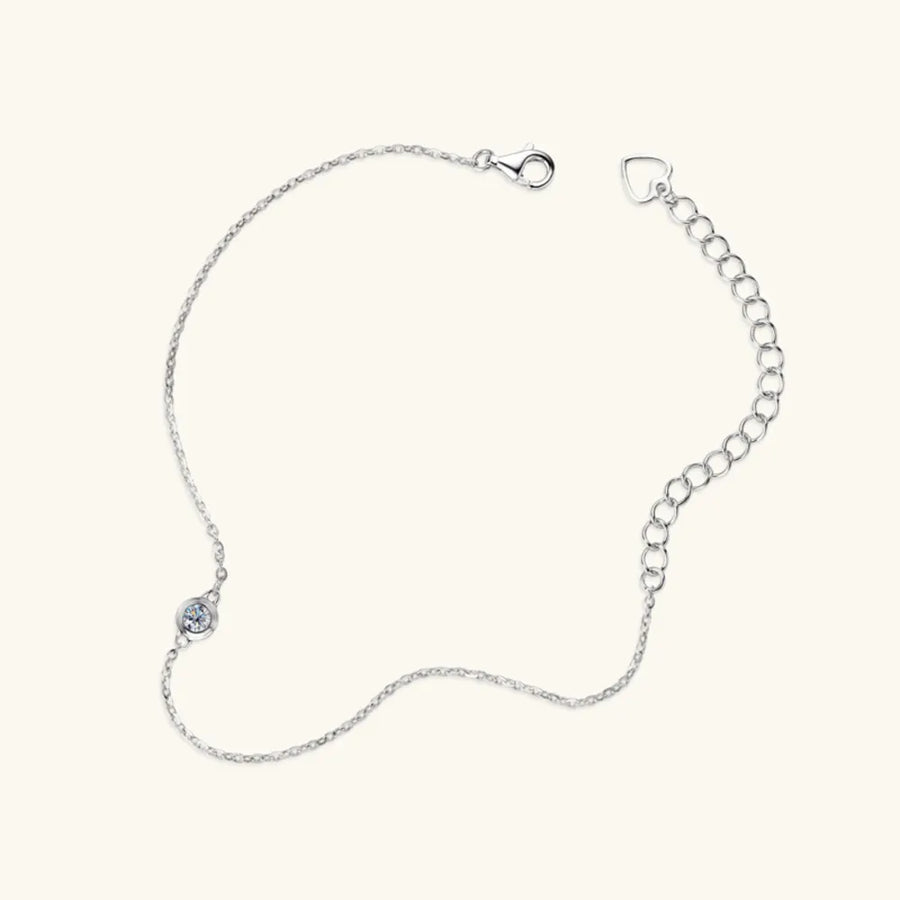 Silver moissanite solitaire chain bracelet with lobster clasp and extender chain.
