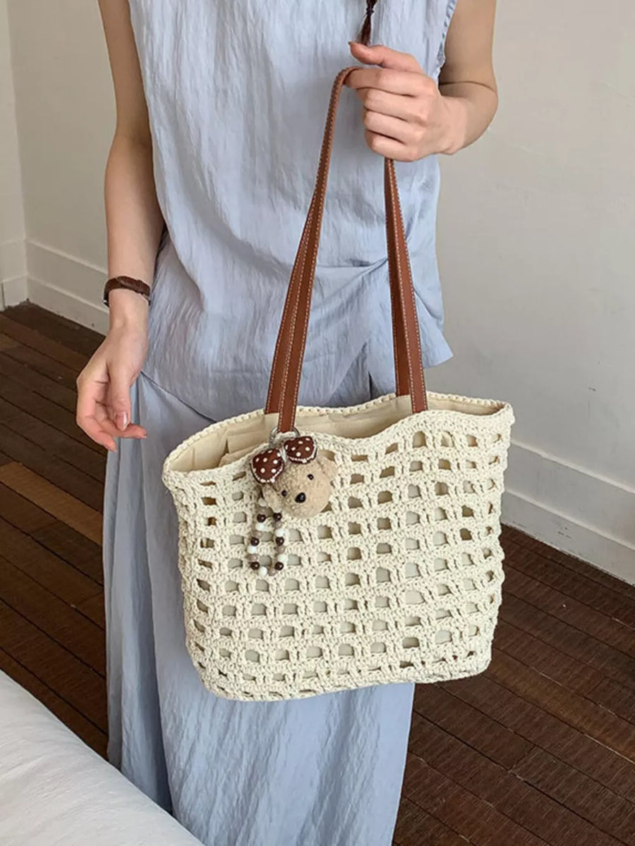 handbag in Cream White with geometric and woven construction