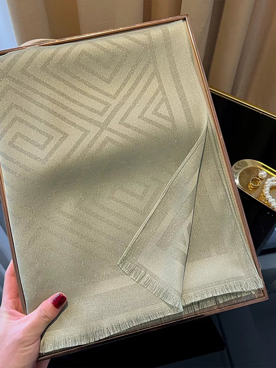 Elegant Tencel cotton scarf in Matcha green with geometric pattern and fringe detail.