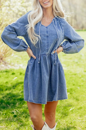 85% cotton, 15% polyester Care instructions: Machine wash cold mini dress in Dusty Blue with loose silhouette