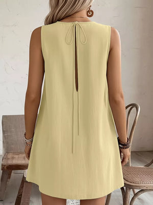 Pastel yellow sleeveless dress with back tie and frill detail