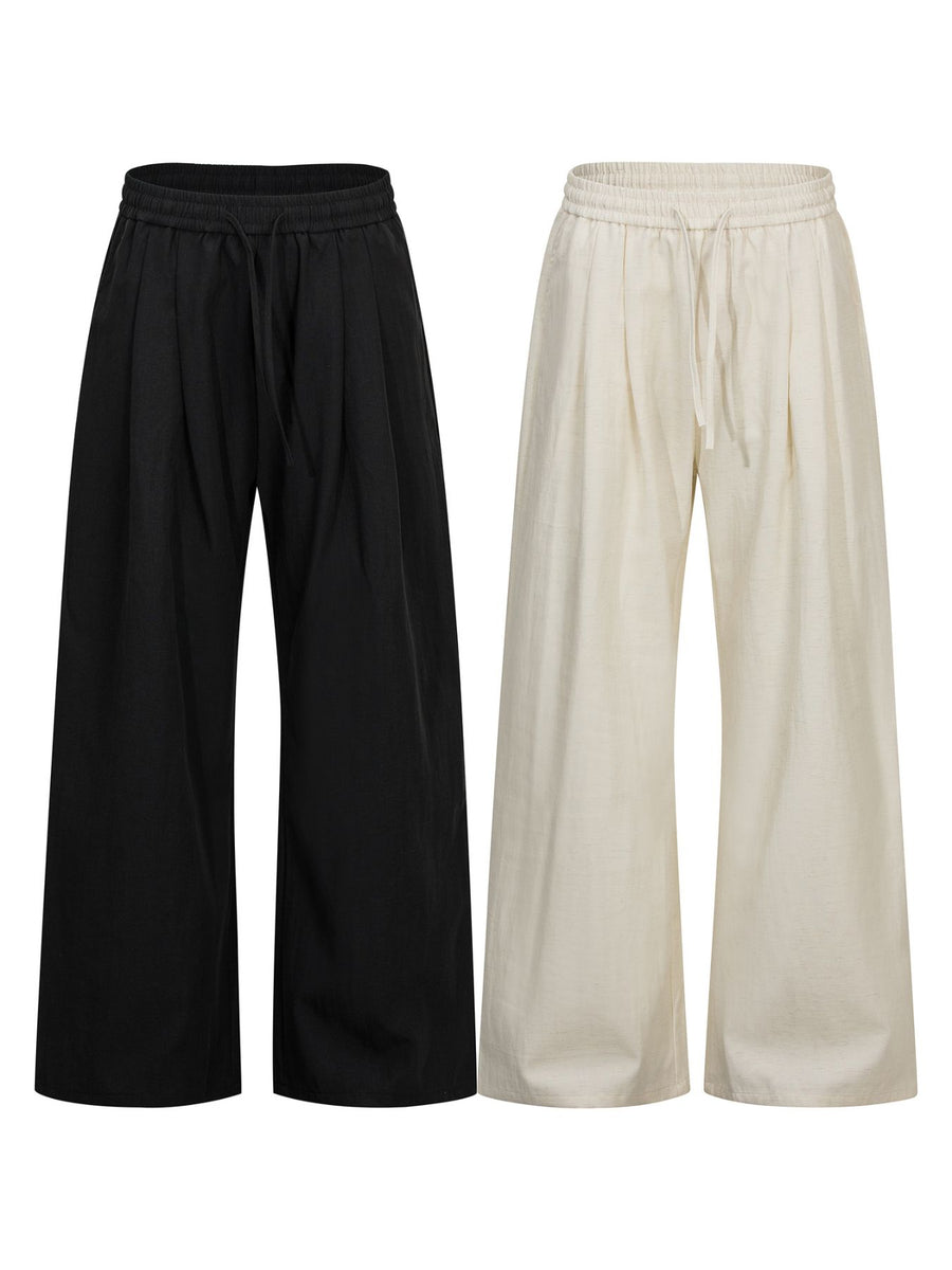 wide-leg pants in Black with drawstring waist and full-length