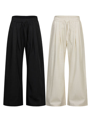 wide-leg pants in Black with drawstring waist and full-length