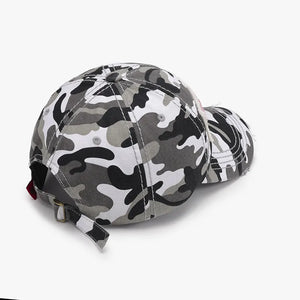 Camouflage patch baseball cap in black and white with adjustable strap.