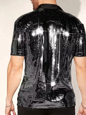 silver button-up shirt featuring buttoned and sequin