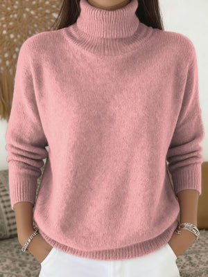 100% polyester Care instructions: Machine wash cold turtleneck sweater in White with relaxed silhouette