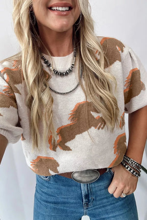 Equestrian-inspired knit sweater in beige with puff sleeves and a horse pattern.
