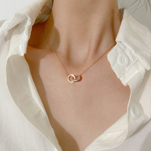 Rose gold double circle pendant necklace with crystal accents