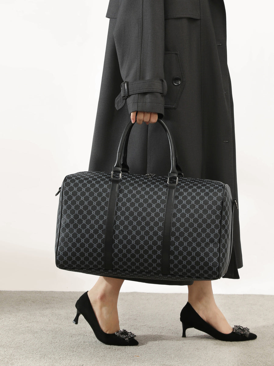 slate gray duffel bag featuring top handles and geometric