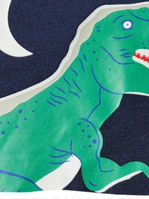 Children's dark navy crew neck t-shirt with a green dinosaur print and white crescent moon detail.