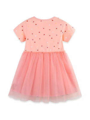 Peach cotton dress with scattered heart print and pink tulle skirt.