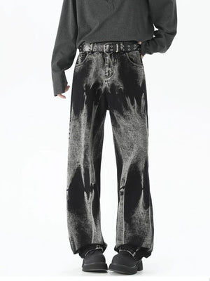 Men's black relaxed fit jeans with acid wash detail and belted waist