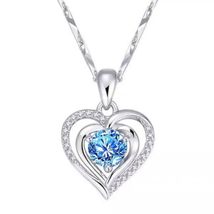 necklace in silver with heart pendant and short