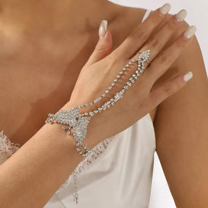 Alloy, Rhinestone, Silver-plated Care instructions: Avoid wearing during exercis hand chain bracelet in clear with fitted