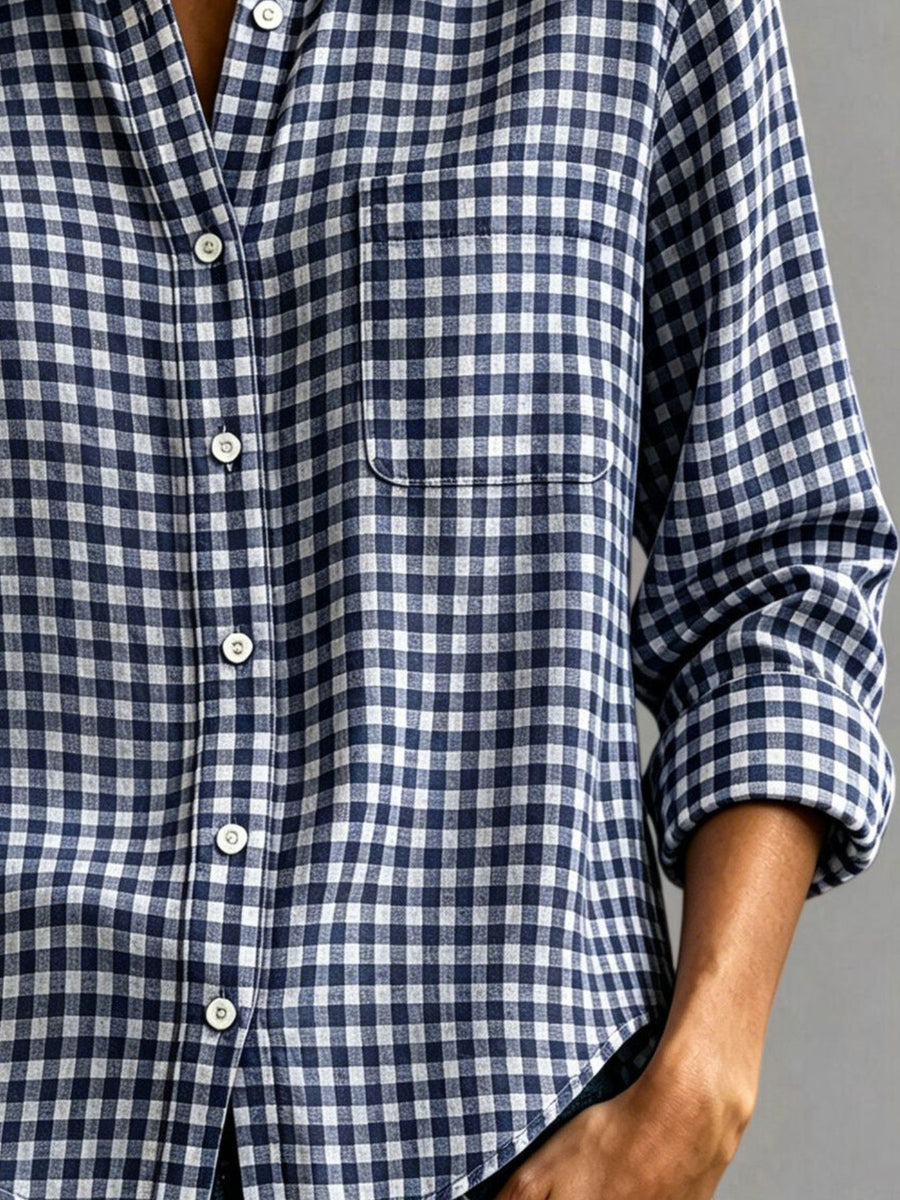 100% polyester Care instructions: Machine wash cold button-down shirt in white with relaxed silhouette