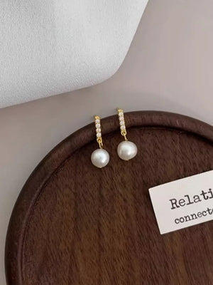 earrings in ivory featuring faux pearl and drop fit