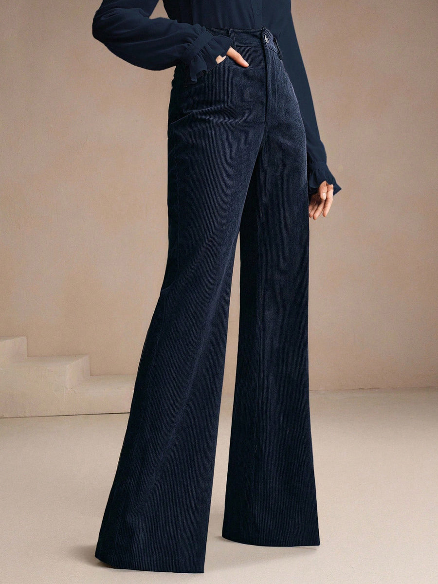 Navy Blue flare pants featuring pocketed and ribbed