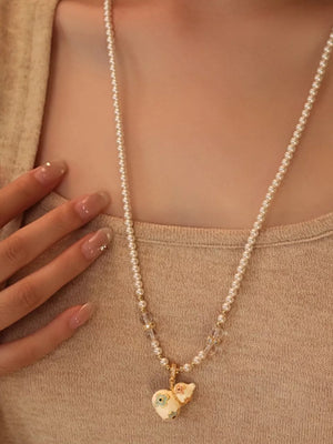 ivory necklace with floral and N/A