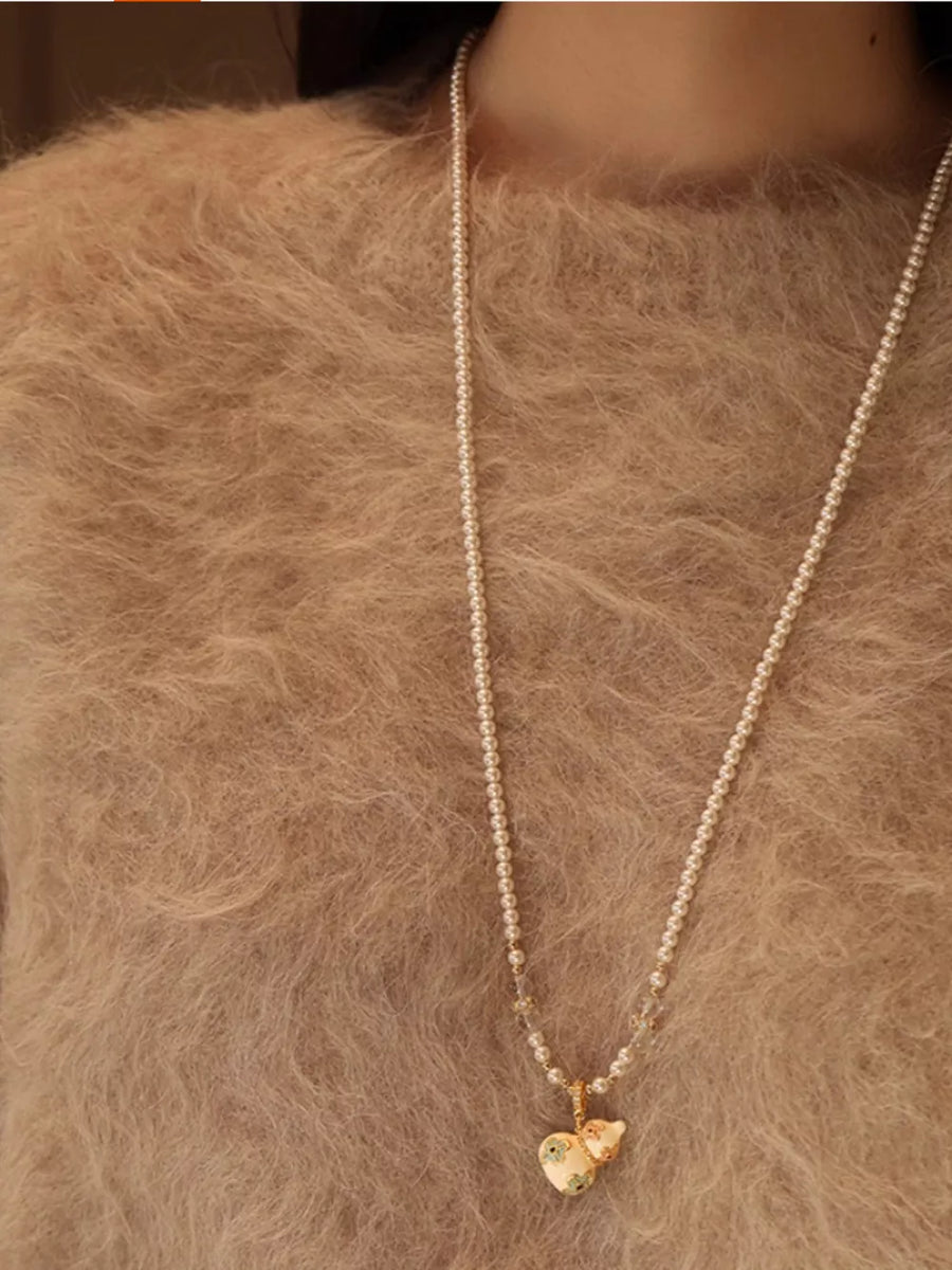 ivory necklace with long and clasp