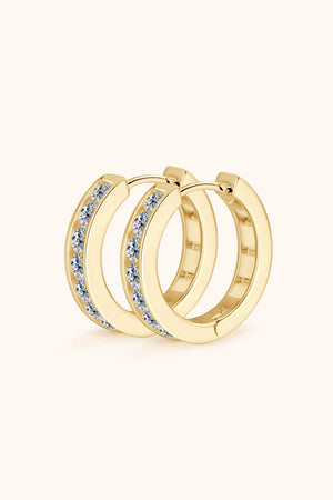 Gold moissanite channel-set hoop earrings with sparkling stones