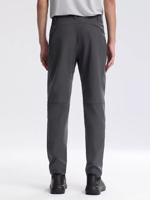 Dark gray sweatpants with a relaxed fit and zippered back pockets.