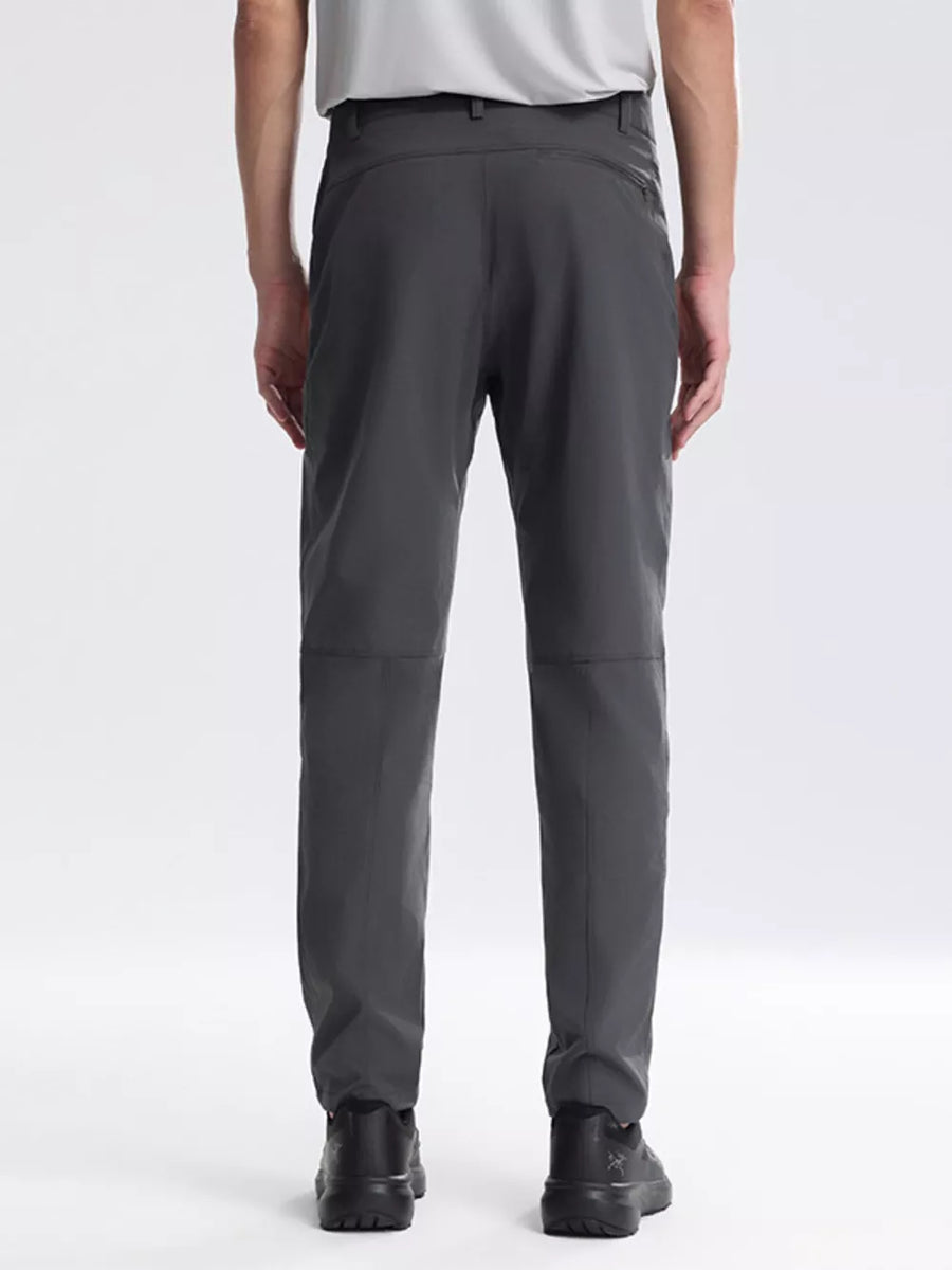 Dark gray sweatpants with a relaxed fit and zippered back pockets.