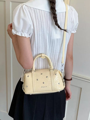 crossbody bag featuring star in White with PU Leather Imported Size & texture