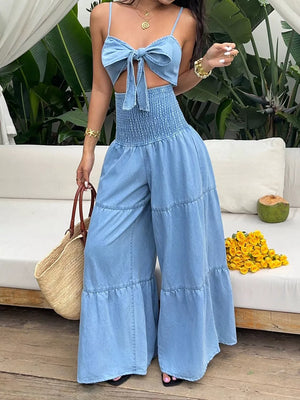 jumpsuit in light blue featuring cutout and flared fit